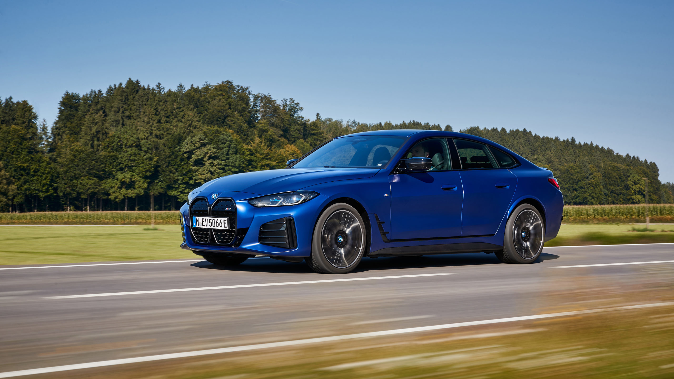 Drag Race! BMW i4 M50 Versus Tesla Model 3 Performance - BimmerLife