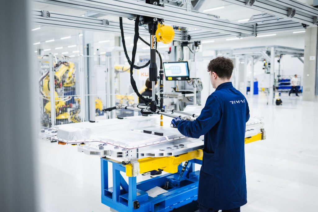 A Rimac employee working in a factory.